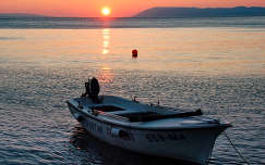 csónak naplemente tenger