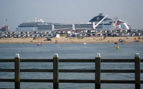 IJMUIDEN-NEDERLAND, View from the pier to the beach and Cruise-ship MSC Opera