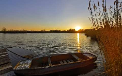 csónak folyó naplemente